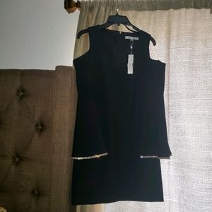 Elegant black cocktail dress with crystals